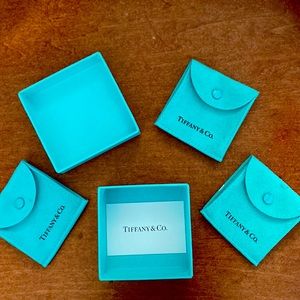Tiffany & Co. box and three suede envelope bags